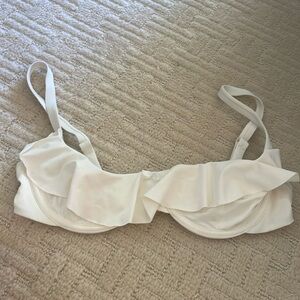 We wore what ruffled cream swim top M